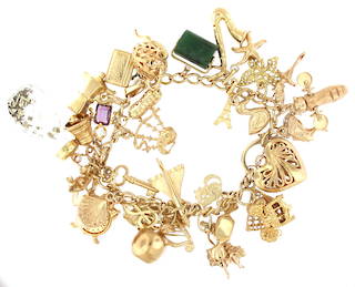 9ct yellow gold curb link 32 x charm bracelet with heart padlock