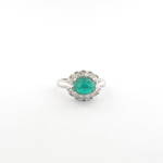 Platinum cabochon emerald and diamond cluster ring