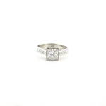 Platinum and diamond solitaire ring with shoulder diamonds
