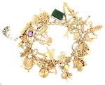 9ct yellow gold curb link 32 x charm bracelet with heart padlock