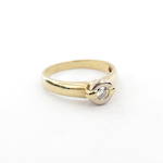 18ct yellow and white gold rub over set diamond ring