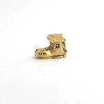 9ct yellow gold 'old woman who lived in a shoe' charm