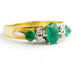 9ct yellow gold and palladium emerald and diamond ring