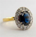 18ct yellow and white gold sapphire and diamond set cluster ring