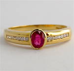 18ct yellow gold natural ruby and diamond set ring