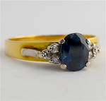 18ct yellow and white gold sapphire and diamond set ring