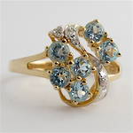 9ct yellow and white gold blue topaz and diamond set cluster ring