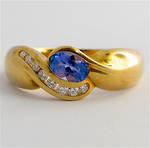 9ct yellow gold tanzanite and diamond set ring