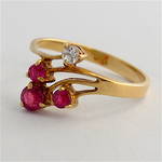 14ct yellow gold ruby and diamond set dress ring