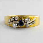 18ct yellow and white gold sapphire and diamond set ring