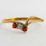 9ct yellow gold garnet/diamond set dress ring