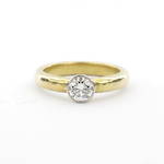 18ct yellow gold and platinum diamond solitaire rub over set ring
