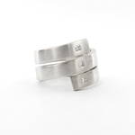 Lady's 18ct white gold coil design diamond set ring