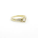 18ct yellow and white gold princess cut diamond solitaire ring with shoulder diamonds