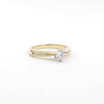 18ct yellow and white gold diamond solitaire ring with shoulder diamonds