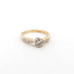 18ct yellow and white gold diamond solitaire ring with shoulder diamonds