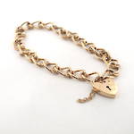 9ct yellow gold textured oval link heart padlock bracelet